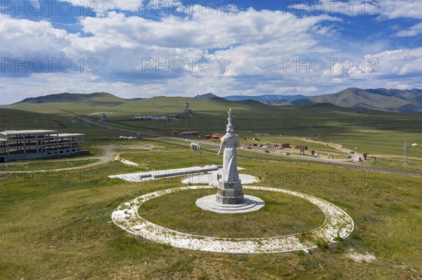 Statue of mongolian Mother and huge equestrian statue of Genghis Khan in the steppe, Mongolia,