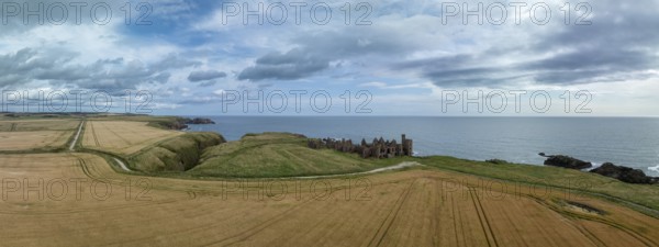 Slains Castle, castle ruins on the cliffs, drone shot, Cruden Bay, Peterhead, Aberdeenshire,