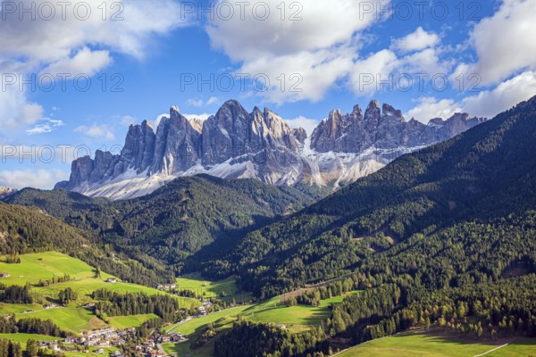 Charming old little church in the Val de Funes. Dolomites on a sunny autumn day. The beautiful