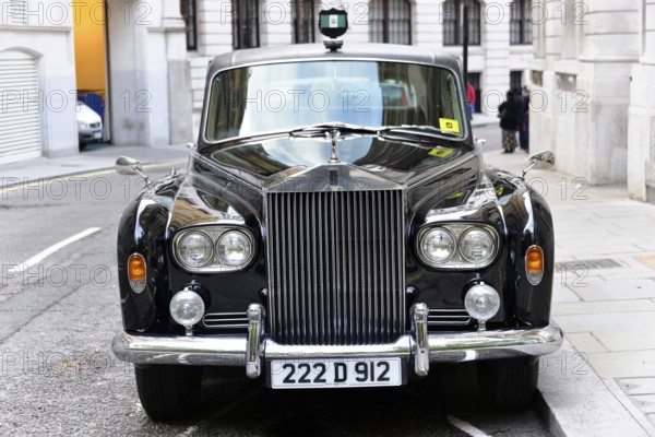 London, London Region, England, United Kingdom, Europe, Black luxury car with shiny finish in a