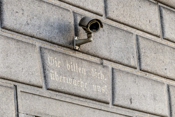 Surveillance camera on a building, symbol for surveillance, internal security, control, data