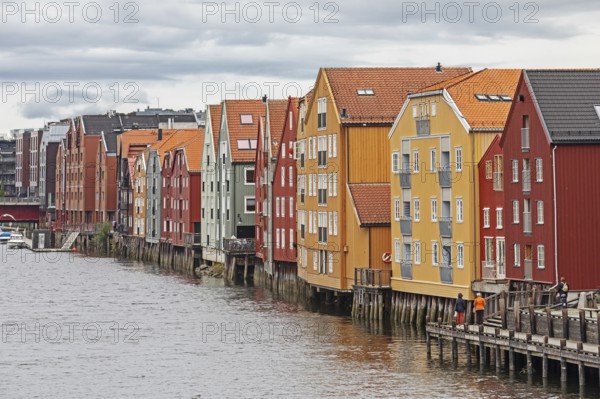 Colourful old timbered storehouses at the river Nidelva in Trondheim, Norway Colorful old timbered