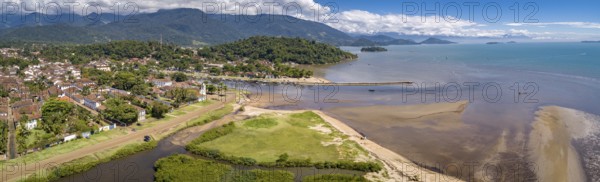Panoramic aerial view to historic town Paraty, tidal river and Jabaquara with green mountains in