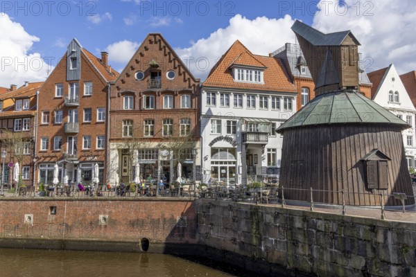 Historic half-timbered houses and gabled houses on the banks of the Old Hanseatic Harbour in the
