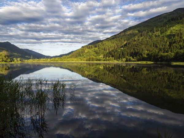 Clouds are reflected in the lake, Gaishorner See in the evening light, Gaishorn am See, Paltental,