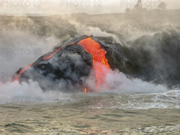 Sea view of Kilauea Volcano in Big Island, Hawaii, United States. Shot taken at sunset when the