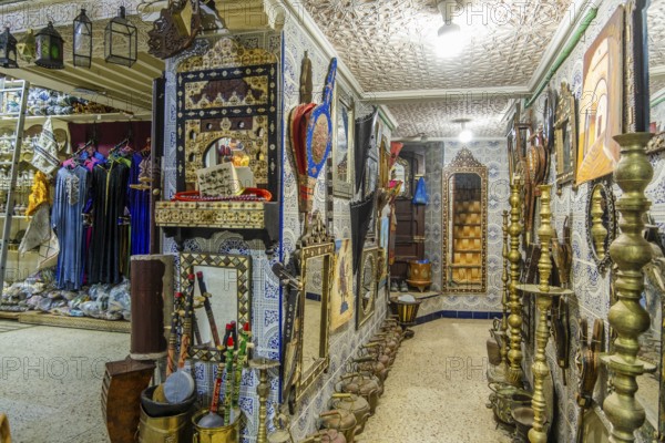 Marketplace in historic medina, full of souvenirs, leather bags, metal pieces, Tetouan, Morocco,