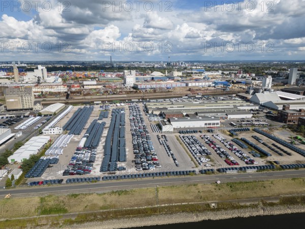 Car terminal in a port on the Rhine. Vehicles are stored, loaded and unloaded, and prepared for