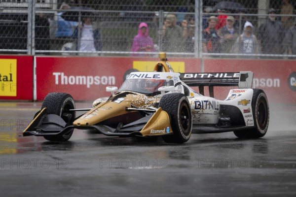 INDYCAR Series driver, RINUS VEEKAY (21) of Hoofddorp, Netherlands, travels through the turns