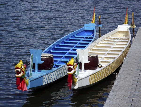 Decorated dragon boats are anchored on the Lotus Lake in Kaohsiung in preparation for the Dragon