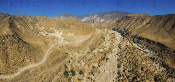 Landscape in Oman, mountains, Wadi Ashawq, road, dry riverbed Salalah, Al Mughsyal / Wadi Ashawq,