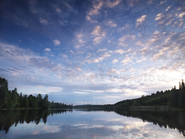 Algonquin Provincial Park summertime nature scenery of the Lake of Two Rivers at sunset. Ontario,