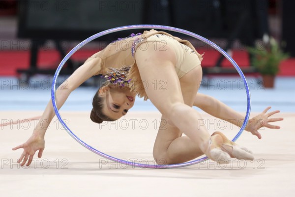 Sofia, Bulgaria - 1 April, 2018: Evita Griskenas USA performs with hoop during Rhythmic Gymnastics