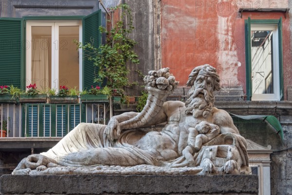 The marble statue of the Nile God in front of the church of Santa Maria Assunta dei Pignatelli,