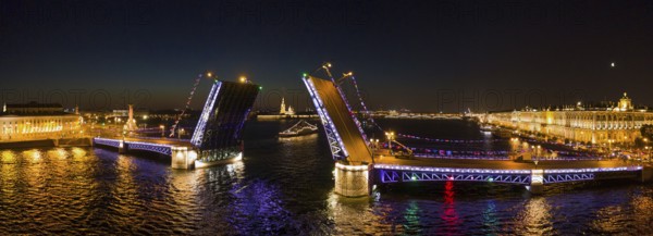 Aerial panorama of the drawn Palace bridge, Winter Palace, Peter and Paul Fortress and Rostral