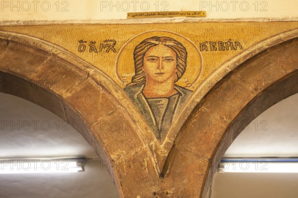 Madaba, Jordan, November 5, 2022: Interior walls of Greek Orthodox church of St George, known by