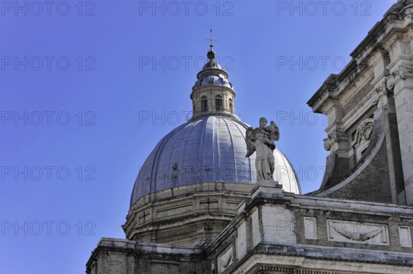 Basilica Santa Maria degli Angeli, Assisi, Umbria, Italy, Detail of an imposing dome with a statue