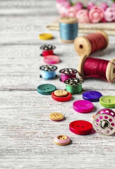Thread and buttons with beads sewing and needlework