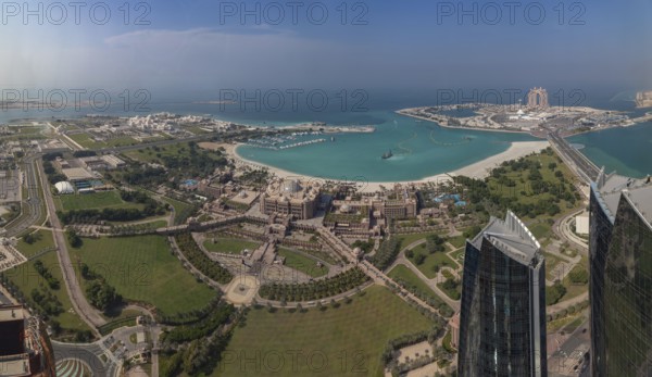 A picture of the Al Ras Al Akhdar District, with the Abu Dhabi Breakwater on the top right corner,