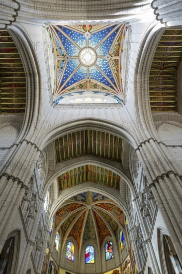Almudena Cathedral: Iconic seat of Madrid's Archdiocese, built over a century, consecrated in 1993,