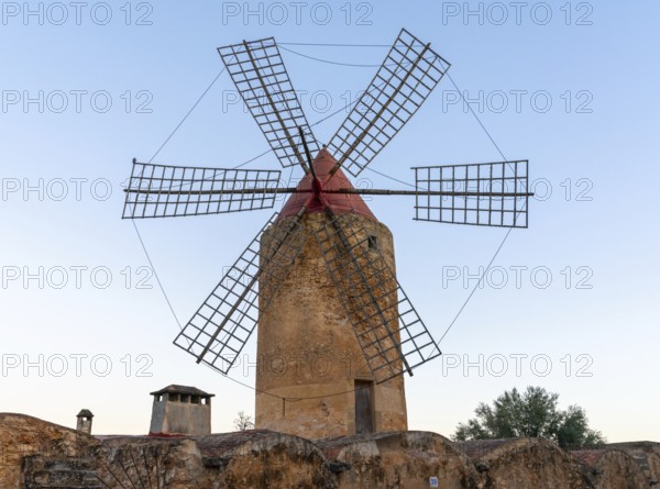 Algaida, Spain, 21 January, 2024: historic windmill in the country town of Algaida in the interior