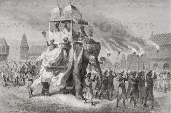 Maharaja of Baroda riding on elephant in procession, India, Asia