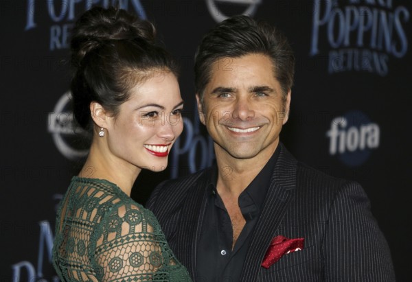 Caitlin Mchugh and John Stamos at the World premiere of Disney's 'Mary Poppins Returns' held at the