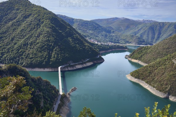 Pivsko jezero, Piva reservoir, behind the village of Plužine, bridge over the reservoir,