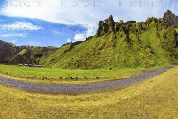 The photo was taken Fisheye lens. Camping in the canyon Pakgil, Iceland. The canyon - green grass