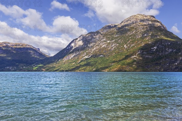 Gerbirgs lake Oppstrynsvatnet in Norway. The greenish-blue colour is caused by clay particles from