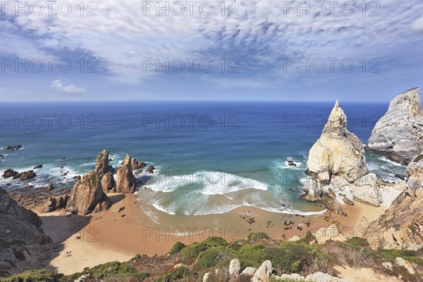 Atlantic coast of Portugal. Two picturesque cliffs of white sandstone cliffs of red sandstone on