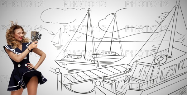 Glamorous pin up sailor girl in the harbour filming yachts with an old retro cinema 8 mm camera and