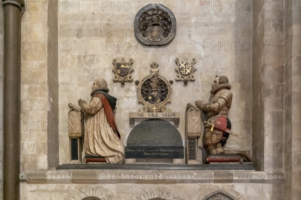 Canterbury, United Kingdom, 10 September, 2022: statue and artwork of praying men inside the