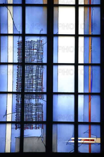 Mainz, Germany - September 04, 2015: The blue-painted new and modern chapel windows of the