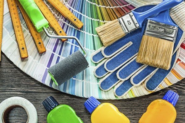 Composition of paint equipment on wooden board