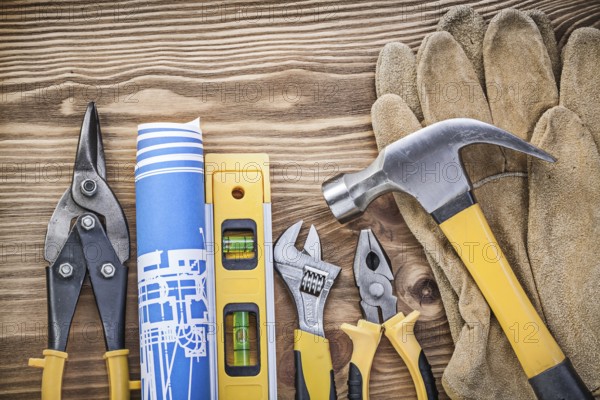 Construction level plan safety gloves claw hammer gripping tongs steel cutter adjustable wrench on