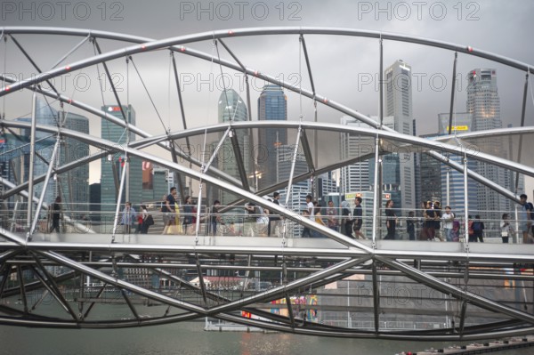 26.01.2020, Singapore, Republic of Singapore, Asia, People crossing the spiral helix bridge in
