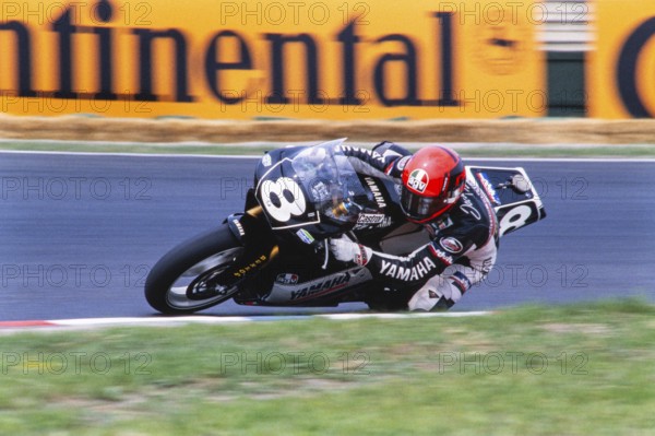 The German Jochen Schmid on the race track on Yamaha 250 cc, German Mitsui-Yamaha Team, Motorcycle