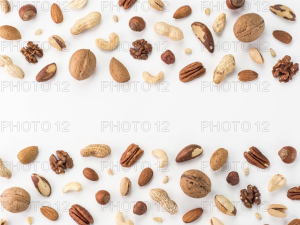 Pattern of nuts mix with copy space. Various nuts isolated on white. Pecan, macadamia, brazil nut,