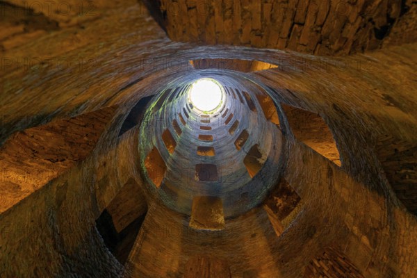 Orvieto, Italy, 18 November, 2023: view looking up from St. Patrick's Well in downtown Orvieto,