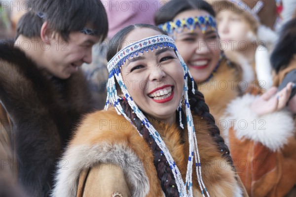 Portrait expression smiling woman in traditional clothing indigenous inhabitants of Kamchatka.