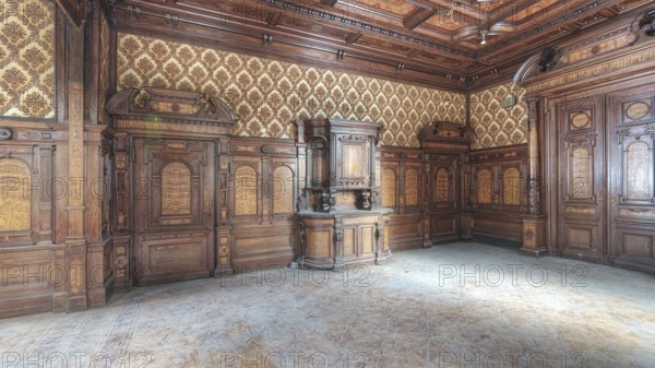 Vacant wooden room with complex pattern and beautiful stucco ceiling, traces of abandonment, Villa