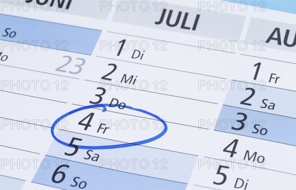 Photo shows a calendar with a pin marking the 4th of July