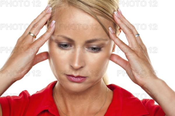A pensive young blonde woman with a headache and migraine, 25, 30, years Studio shot, Federal