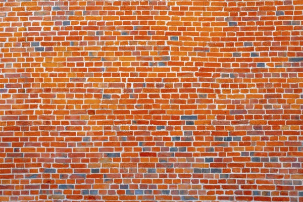 The background of the old red brick wall for design interior and various scenes or as a background