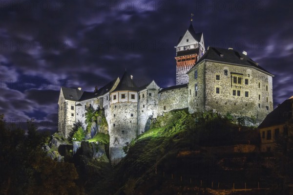 Loket Castle is a 12th-century Gothic style castle located about 12 km from Karlovy Vary on a