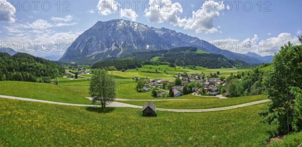 Summer austrian landscape with Grimming mountain (2.351 m), an isolated peak in the Dachstein