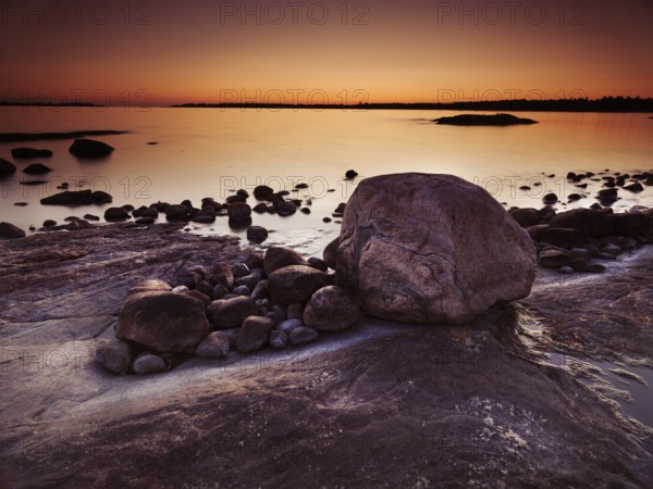 Beautiful twilight scenery of rocks on a shore of Georgian Bay, Muskoka, Ontario, Canada, North