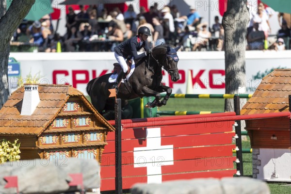 Ben Maher of Great Britain, riding Exit Remo competes in the BMO Nations Cup during the CSIO Spruce