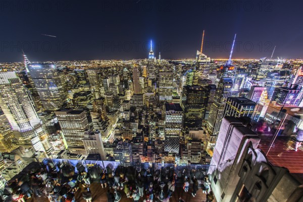 Rockefeller Center Observation Deck people 5 a view of the night view from the (top of the Rock).
